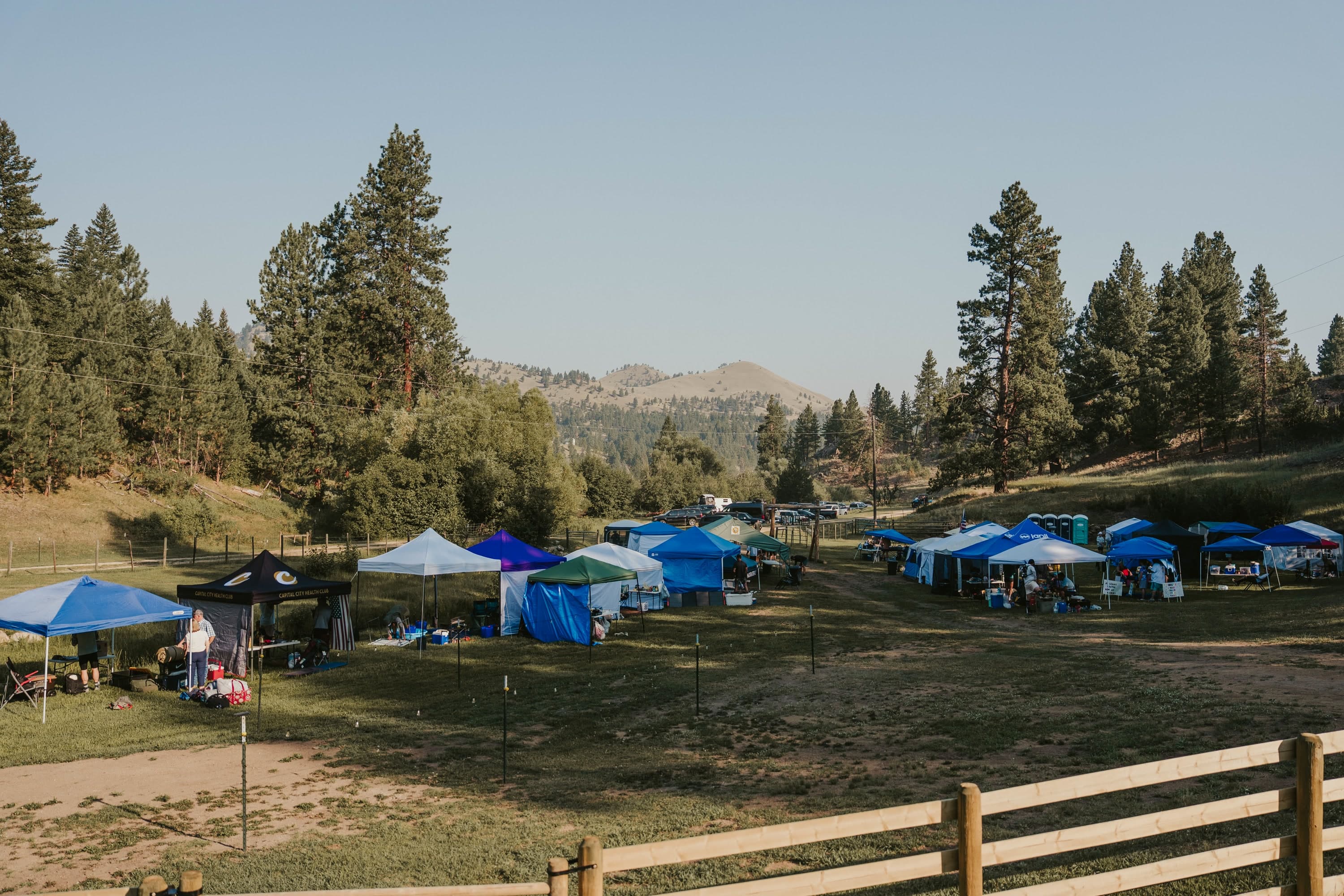 Crew tents set up along the Backyard Ultra corral at the ranch